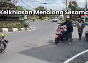 Aksi Kanit Patroli Satuan Lalulintas Polres Bangli Bantu Pengendara Sepeda Motor mogok kehabisan Bensin.
